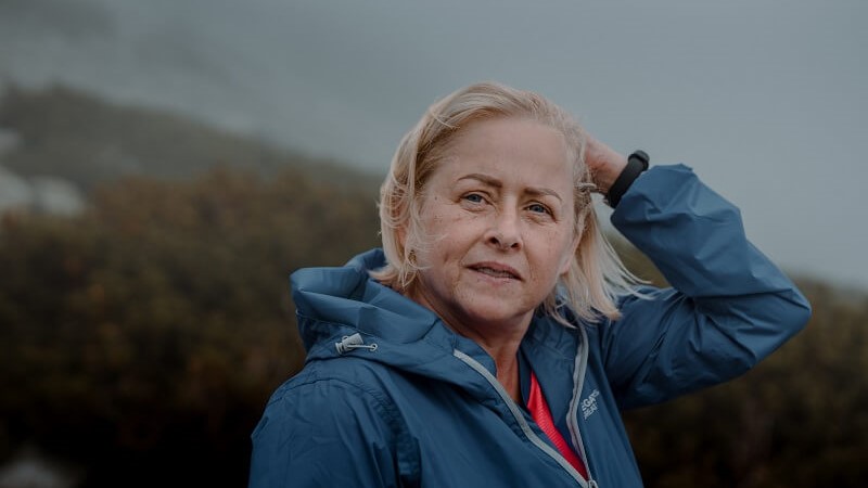 Blonde granny on a romantic hike